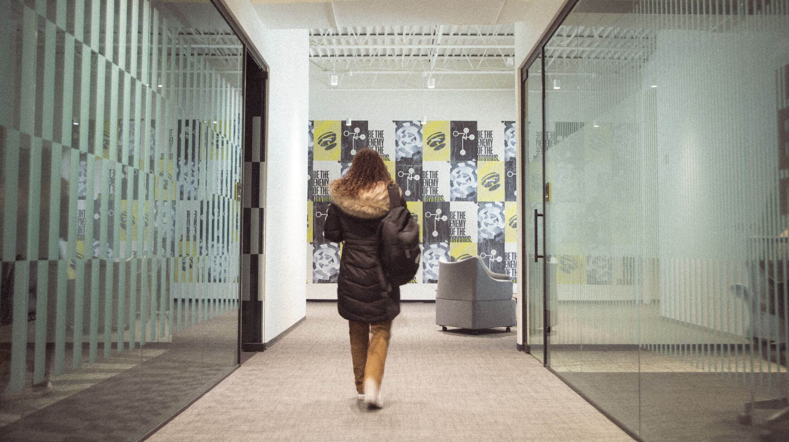 Walking down the hallway between 2 meeting rooms